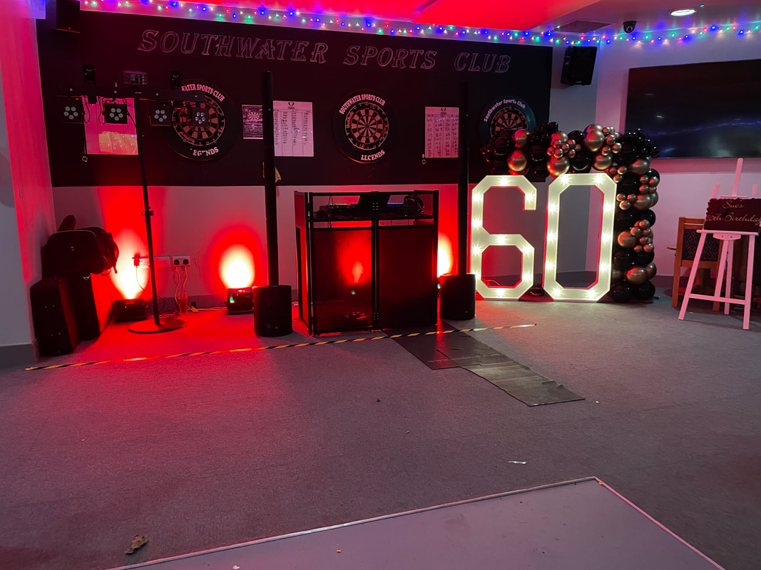 A picture of the disco set up at a 60th birthday party